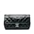 Borsa a tracolla media Chanel in vernice nera Coco Shine con patta Nero Pelle  ref.1174499