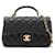 Mini sac à rabat Chanel classique intemporel avec poignée supérieure GHW Cuir Noir  ref.1179059