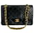 Timeless Chanel Klassische, gefütterte Flap Chain Bag aus schwarzem Leder, mittelgroß  ref.1180829