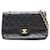 Chanel De color negro 1989 Bolso mediano con solapa con forro clásico Cuero  ref.1208558