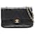 Chanel De color negro 1989 Bolso mediano con solapa con forro clásico Cuero  ref.1208559