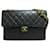 Bolsa Chanel Black Jumbo Classic de pele de cordeiro com aba simples Preto Couro  ref.1208769