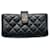 CHANELpurse wallet phone case in black Leather  ref.1208929