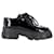 Chaussures Derby Prada Monolith Platform en Cuir Verni Noir Cuir vernis  ref.1209009