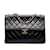 Bolsa de ombro com aba preta Chanel Jumbo Classic com forro de pele de cordeiro Preto Couro  ref.1213528