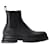 Wander Ankle Boots - Alexander McQueen - Calfskin - Black Leather Pony-style calfskin  ref.1218156