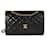 Timeless Chanel Vintage Bolso con solapa forrado en piel de cordero negra acolchada Negro Cuero  ref.1219881