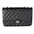 Timeless Chanel Black Quilted Caviar Jumbo Classic Single Flap Bag Leather  ref.1219940