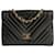Chanel Bolsa de ombro vintage Chanel em couro preto com ponto em V  ref.1220787