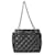 Chanel schwarz gesteppte gealterte Einkaufstasche aus Kalbsleder neu aufgelegt  ref.1221129