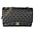 Bolsa Chanel Black Caviar Maxi com aba forrada Preto Couro  ref.1222823