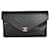 Bolso de mano tipo sobre de piel de cordero con chevron negro Chanel Cuero  ref.1225227