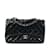 Bolsa de ombro com aba preta Chanel Jumbo Classic patenteada Preto Couro  ref.1228432