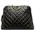 Bolso de hombro tipo cúpula de piel de cordero acolchado negro Chanel Cuero  ref.1229422