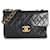 Timeless Chanel Jahrgang 24K Schwarze Maxi-XL-Überschlagtasche aus gestepptem Lammleder  ref.1230811