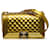 Bolso mediano con solapa de charol dorado Chanel Boy Cuero  ref.1234240