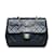 Bolso Chanel Mini Classic cuadrado de piel de cordero con solapa única negro Cuero  ref.1238143