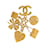 Broche con dijes de icono de Chanel dorado Metal  ref.1240313