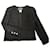 Chanel Veste en tweed noir à boutons CC intemporels  ref.1245602