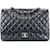 Chanel Maxi-gefütterte Flap-Tasche aus gestepptem Lammleder mit silberner Hardware Schwarz Leinwand  ref.1246839