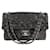 Sac à rabat classique Jumbo en maille à sequins noirs cachés de Chanel avec quincaillerie argentée Synthétique  ref.1250115