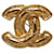 Broche matelassée Chanel CC dorée Métal  ref.1256109
