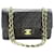 Chanel De color negro 1989-1991 Bolso pequeño Classic con solapa y forro de piel de cordero Cuero  ref.1257976