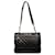 Chanel schwarze gesteppte Lammfell-Tasche Leder  ref.1258080