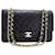 Chanel Pele de cordeiro média preta vintage 1986 aba forrada clássica Preto Couro  ref.1266260