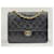 Wallet On Chain Bolso de solapa pequeño clásico atemporal de Chanel Negro Cuero  ref.1269099
