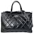 Bolso satchel CC de piel de becerro acolchado Chanel negro Cuero  ref.1269503