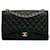 Bolso negro con solapa única Chanel Maxi Classic Caviar Cuero  ref.1269529
