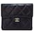 Cartera Chanel CC de piel de cordero con solapa triple negra Negro Cuero  ref.1283561