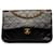 Bolsa de ombro com aba preta Chanel média clássica forrada de pele de cordeiro Preto Couro  ref.1283697