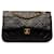 Bolsa de ombro com aba preta Chanel média clássica forrada de pele de cordeiro Preto Couro  ref.1283698