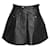 Minifalda acampanada de cuero negro con tachuelas plateadas de Balmain  ref.1284812