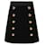 Dolce & Gabbana Mini-jupe en laine ornée de boutons Coton Viscose Elasthane Noir  ref.1284932