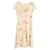Armani Collezioni Vestido de manga corta con estampado de lunares en seda beige  ref.1294492