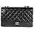 Timeless Bolsa Chanel Black acolchoada pele de cordeiro Jumbo Classic com aba simples Preto Couro  ref.1294604