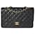 Timeless Bolsa Chanel Caviar Jumbo Classic Acolchoado Preto com Aba Simples Couro  ref.1294607