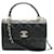 Trendy CC Petit sac à rabat tendance CC à double poignée en cuir d'agneau matelassé noir Chanel  ref.1299247