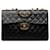 Bolsa de ombro Chanel Maxi XL clássica preta em pele de cordeiro com aba única Preto Couro  ref.1302434