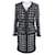 Chanel 12.000 dollari giacca e gonna in tweed nero con bottoni gioiello.  ref.1303022