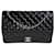 Timeless Bolsa Chanel Black acolchoada de couro envernizado Maxi Classic com aba com forro Preto  ref.1305465
