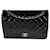 Timeless Bolso con solapa con forro clásico de charol acolchado negro de Chanel Cuero  ref.1305467