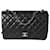 Timeless Bolsa Chanel Black acolchoada pele de cordeiro Jumbo Classic com aba simples Preto Couro  ref.1305620