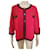 Chanel cashmere cardigan in red with navy blue trim.  ref.1306146