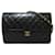 Chanel Bolso bandolera acolchado CC con solapa Negro Cuero  ref.1311093