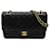 Chanel Bolso mediano con solapa con forro clásico Negro Piel de cordero  ref.1311235