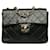 Chanel CC Mini Classic Cuadrado Solapa Negro Piel de cordero  ref.1312426